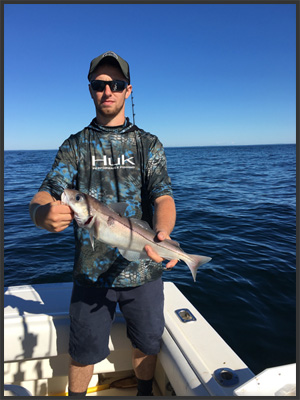 Photo of man with fish